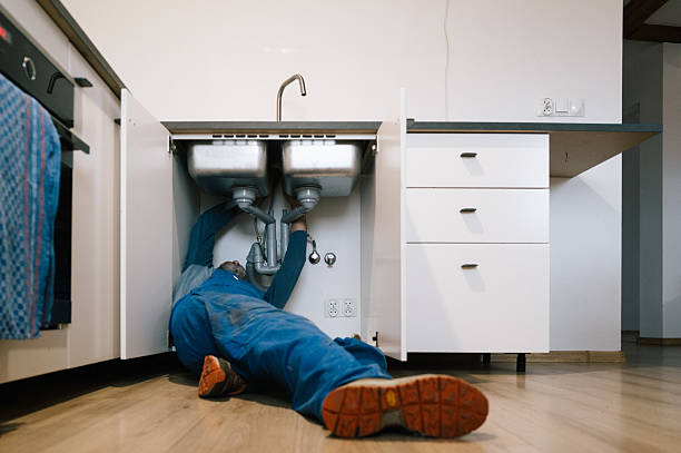 Professional Emergency Plumber technician working in Townsend, MA